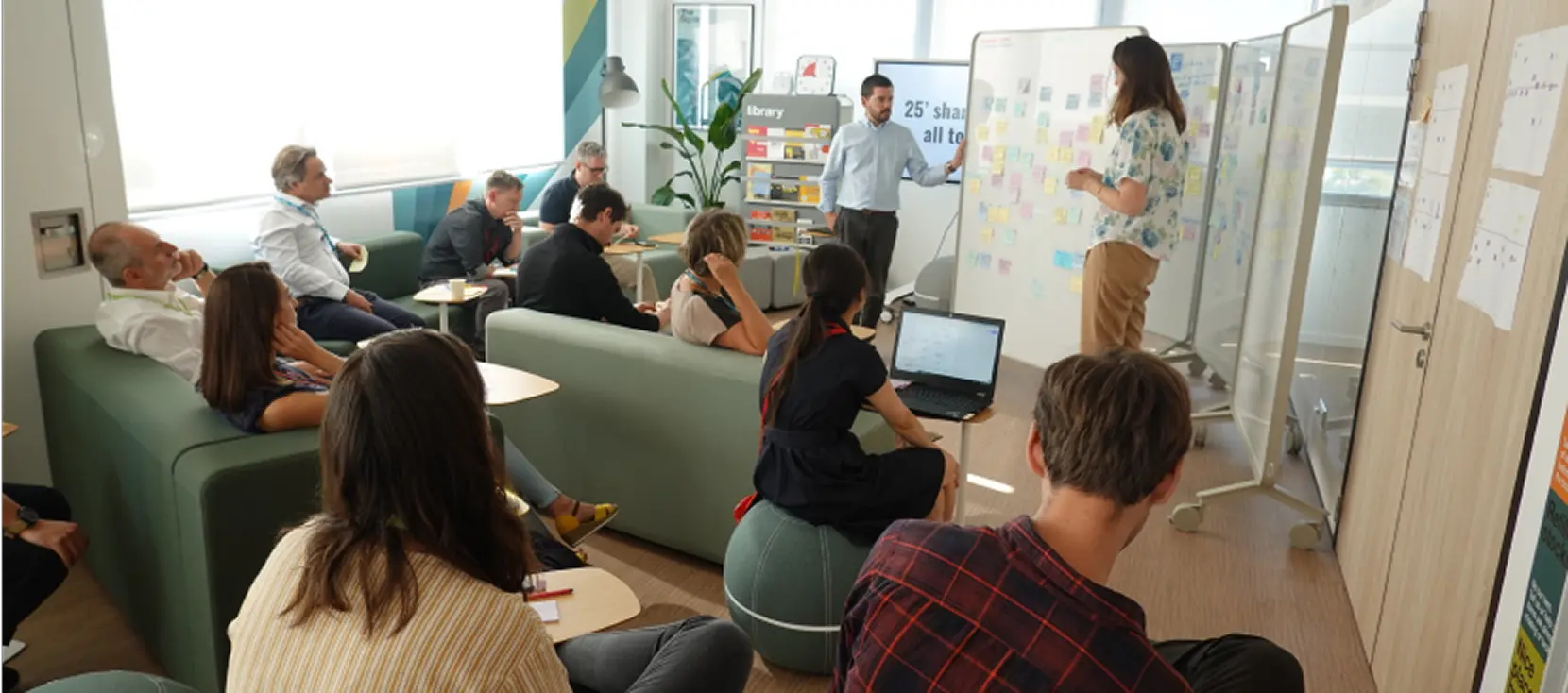 Your humble servitor facilitating the Design Sprint in front of a captivated audience